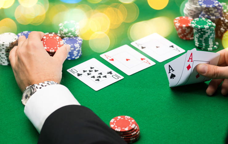 A poker hand showing pocket aces.