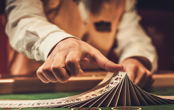 A dealer shuffling cards.