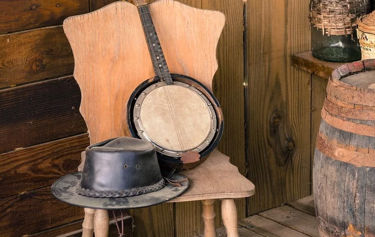 A banjo and a cowboy hat.