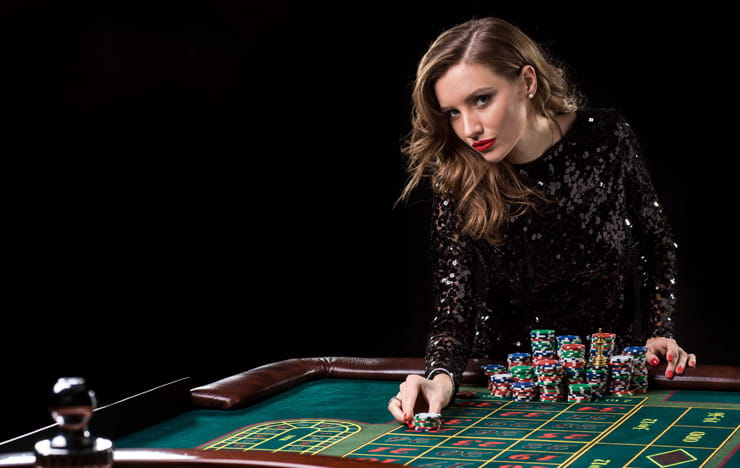 A woman playing roulette.