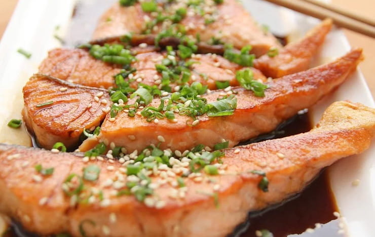 Baked salmon on a plate.