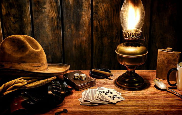 A cowboy hat and a gas lantern.