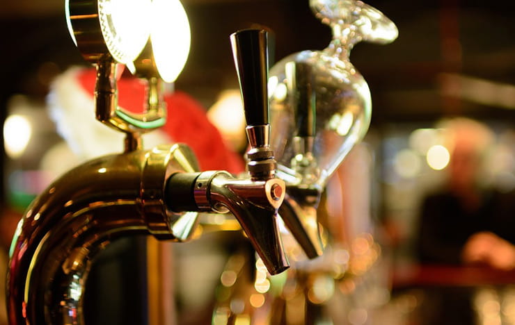 Beer taps in a row.